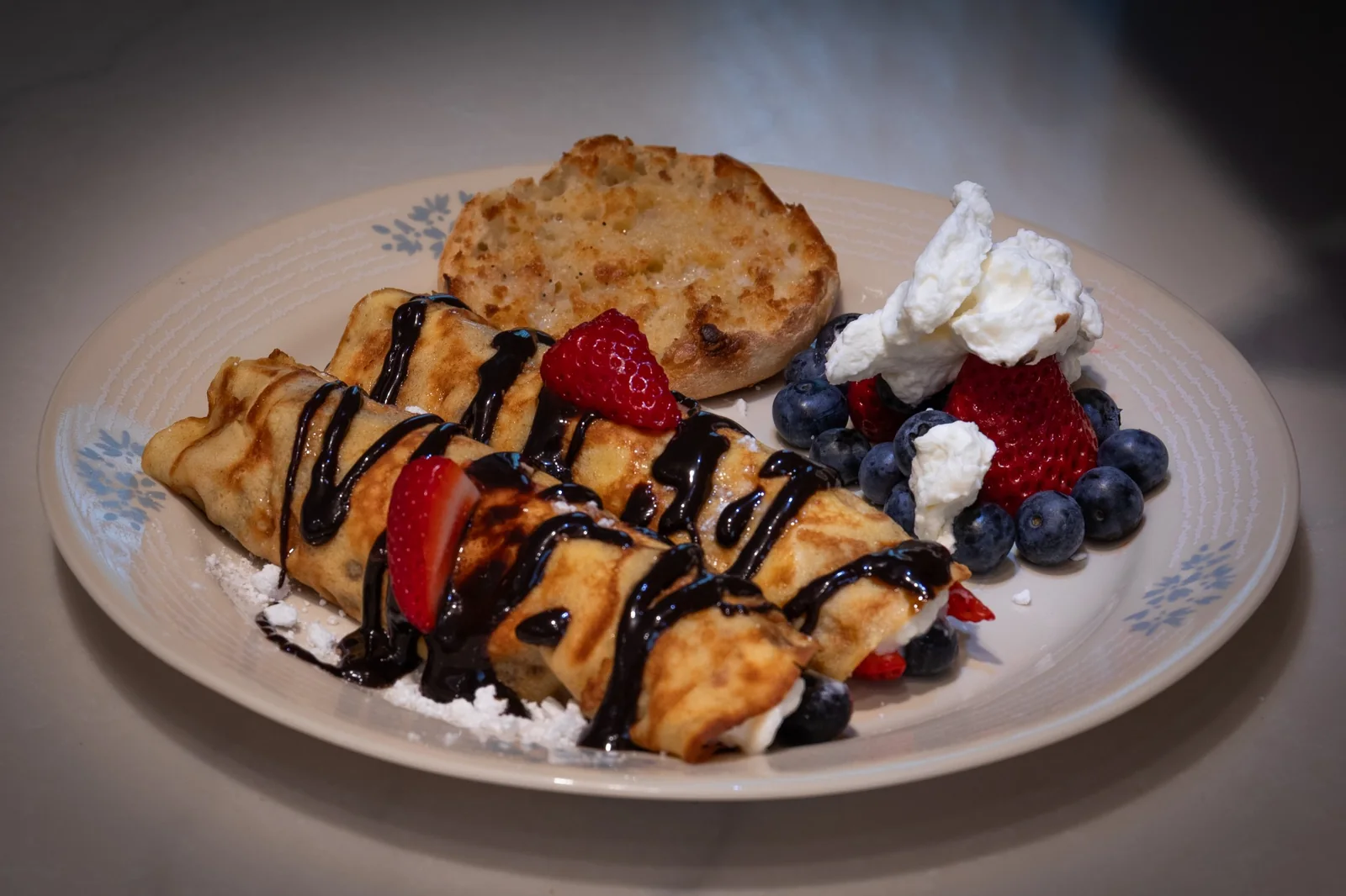 Breakfast crepe and fresh fruit food photography