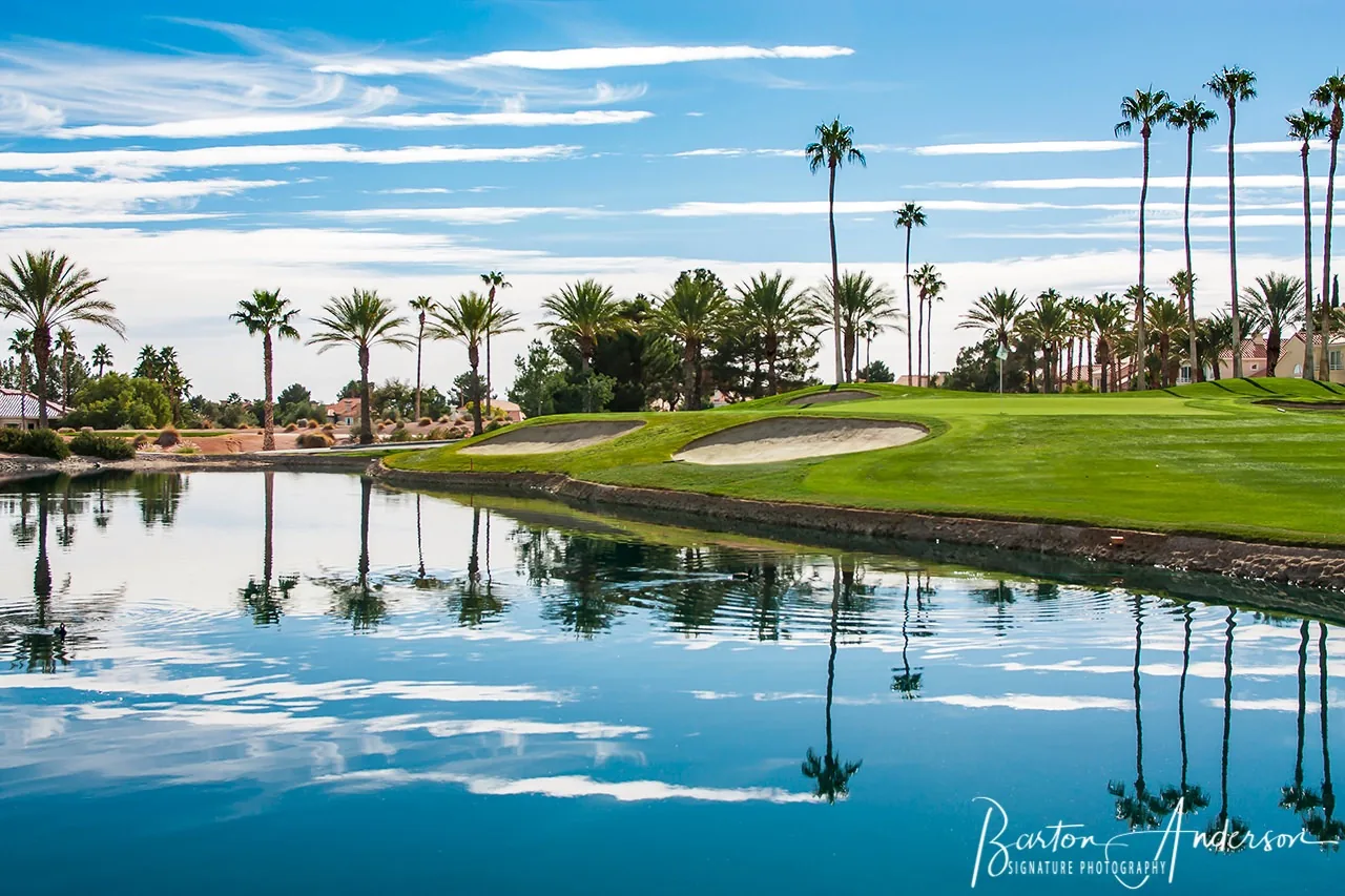 Golf course photography with water and palm trees